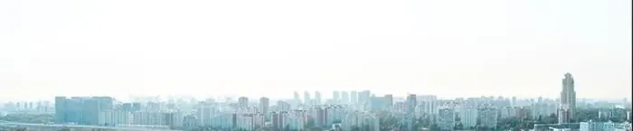 Framed Print : A big city at sunset, a panorama of multi-storey residential buildings Framed Print : A big city at sunset, a panorama of multi-storey residential buildings