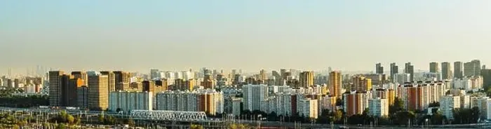 Framed Print : A big city at sunset, a panorama of multi-storey residential buildings Framed Print : A big city at sunset, a panorama of multi-storey residential buildings