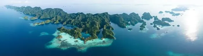 Framed Print : Biodiverse coral reefs surround the dramatic limestone islands that have been uplifted from Raja Ampat's beautiful, tropical seascape Framed Print : Biodiverse coral reefs surround the dramatic limestone islands that have been uplifted from Raja Ampat's beautiful, tropical seascape