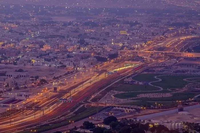 Framed Print : bird eye aerial View of Doha City after sunset.. Doha roads and traffic Framed Print : bird eye aerial View of Doha City after sunset.. Doha roads and traffic