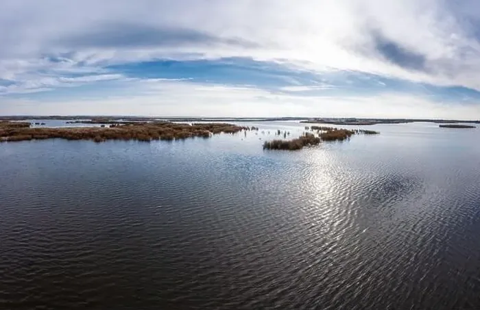 Framed Print : Bird's-eye view of the beautiful Samarskie Plavni in the warm evening light in Ukraine. Aerial panoramic drone shot Framed Print : Bird's-eye view of the beautiful Samarskie Plavni in the warm evening light in Ukraine. Aerial panoramic drone shot