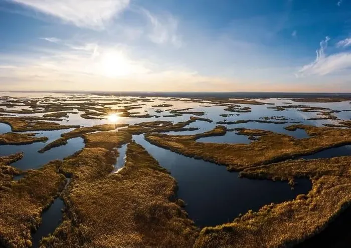 Framed Print : Bird's-eye view of the beautiful Samarskie Plavni in the warm evening light in Ukraine. Aerial panoramic drone shot Framed Print : Bird's-eye view of the beautiful Samarskie Plavni in the warm evening light in Ukraine. Aerial panoramic drone shot