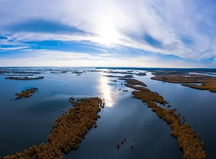Framed Print : Bird's-eye view of the beautiful Samarskie Plavni in the warm evening light in Ukraine. Aerial panoramic drone shot Framed Print : Bird's-eye view of the beautiful Samarskie Plavni in the warm evening light in Ukraine. Aerial panoramic drone shot