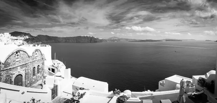Framed Print : Black and white image of white architecture in Santorini Oia, Greece. Monochrome travel landscape. Dramatic process, Aegean sea in black and white Framed Print : Black and white image of white architecture in Santorini Oia, Greece. Monochrome travel landscape. Dramatic process, Aegean sea in black and white