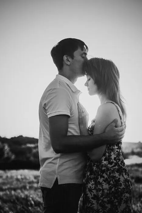 Framed Print : Black white photography romantic couple standing and kissing on background summer meadow sunset Framed Print : Black white photography romantic couple standing and kissing on background summer meadow sunset