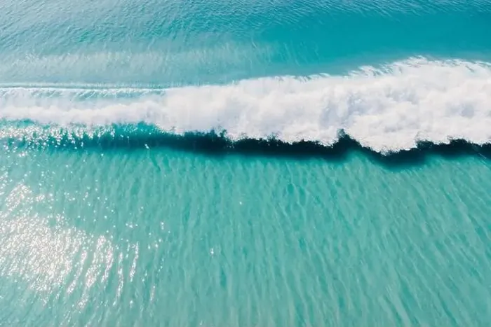 Framed Print : Blue clear ocean and surfing wave. Surfing waves in tropics. Aerial view Framed Print : Blue clear ocean and surfing wave. Surfing waves in tropics. Aerial view