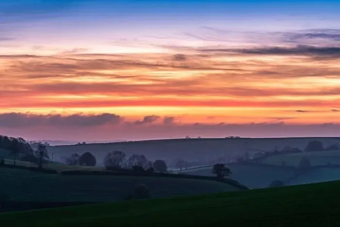 Framed Print : BLUE HOUR over fields and farms from a drone, Devon, England, Europe Framed Print : BLUE HOUR over fields and farms from a drone, Devon, England, Europe