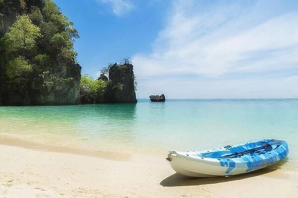 Blue kayaks on the tropical beach in Phuket, Thailand. Summer, Vacation and Travel concept
