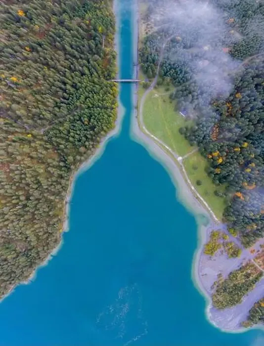 Framed Print : blue lake heiterwang with channel bridge at fall with view from above Framed Print : blue lake heiterwang with channel bridge at fall with view from above