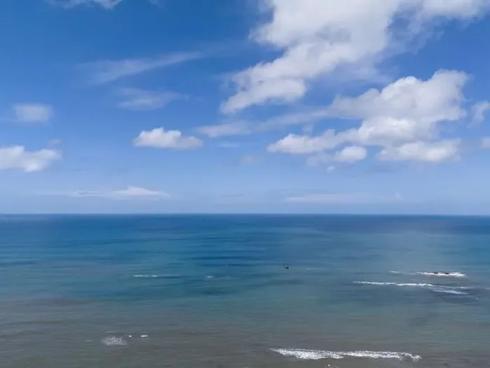 Framed Print : Blue ocean surface under sky with white clouds aerial drone view Framed Print : Blue ocean surface under sky with white clouds aerial drone view