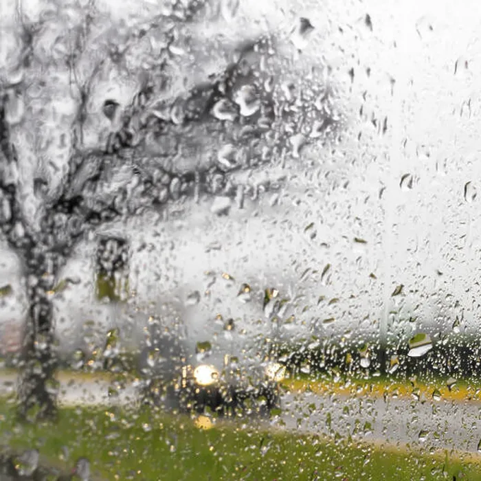 Framed Print : Blurry car silhouette seen through water drops on the car windshield Framed Print : Blurry car silhouette seen through water drops on the car windshield