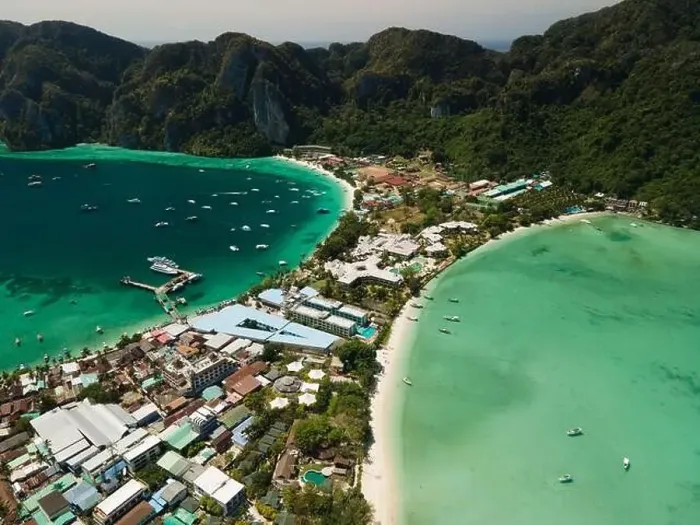 Framed Print : Many boats sailing the turquoise waters of Koh Phi Phi Don, Thailand