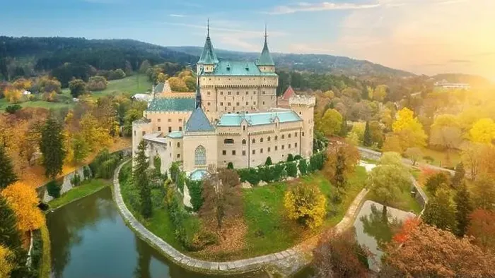 Framed Print : Bojnice castle. Panoramic aerial view of a neo-gothic romantic fairy-tale castle in a colourful autumn garden Framed Print : Bojnice castle. Panoramic aerial view of a neo-gothic romantic fairy-tale castle in a colourful autumn garden