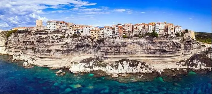 Framed Print : Bonifacio - splendid coastal town in south of Corsica island, aerial drone view of houses hanging over rocks. France Framed Print : Bonifacio - splendid coastal town in south of Corsica island, aerial drone view of houses hanging over rocks. France