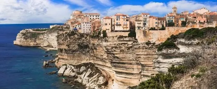 Framed Print : Bonifacio - splendid coastal town in south of Corsica island, aerial drone view of houses hanging over rocks. France Framed Print : Bonifacio - splendid coastal town in south of Corsica island, aerial drone view of houses hanging over rocks. France