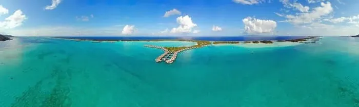 Framed Print : BORA BORA, FRENCH POLYNESIA -4 DEC 2018- Aerial view of overwater bungalow villas at the St Regis Resort Bora-Bora in Framed Print : BORA BORA, FRENCH POLYNESIA -4 DEC 2018- Aerial view of overwater bungalow villas at the St Regis Resort Bora-Bora in