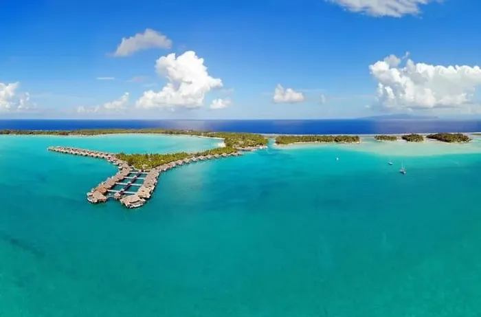 Framed Print : BORA BORA, FRENCH POLYNESIA -4 DEC 2018- Aerial view of overwater bungalow villas at the St Regis Resort Bora-Bora in Framed Print : BORA BORA, FRENCH POLYNESIA -4 DEC 2018- Aerial view of overwater bungalow villas at the St Regis Resort Bora-Bora in