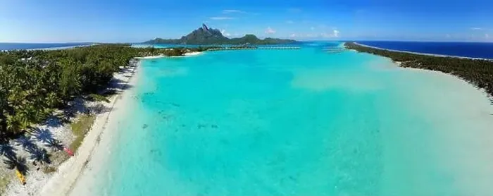 Framed Print : BORA BORA, FRENCH POLYNESIA -4 DEC 2018- Aerial view of overwater bungalow villas at the St Regis Resort Bora-Bora in Framed Print : BORA BORA, FRENCH POLYNESIA -4 DEC 2018- Aerial view of overwater bungalow villas at the St Regis Resort Bora-Bora in