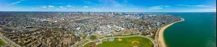 Framed Print : Boston Downtown Financial District and Back Bay skyline panoramic aerial view in spring from South Boston