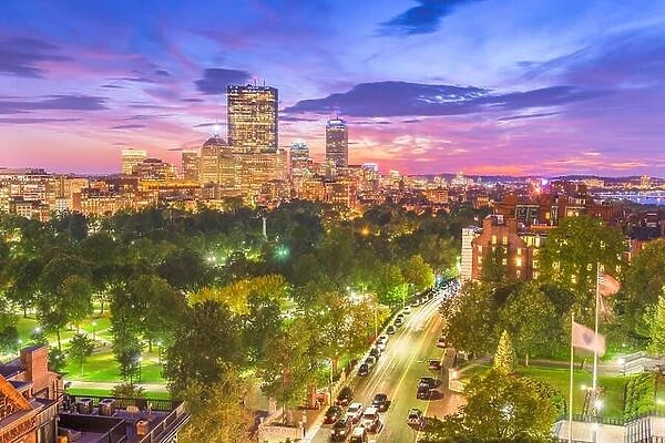 Boston, Massachusetts, USA downtown skyline over the park at dusk