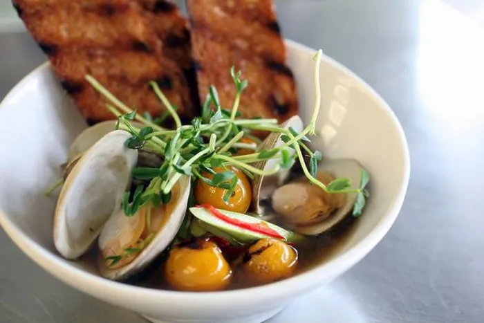 Framed Print : Bowl of clams in broth with roasted cherry tomatoes, cucumbers, red pepper, pea shoots and toast Framed Print : Bowl of clams in broth with roasted cherry tomatoes, cucumbers, red pepper, pea shoots and toast