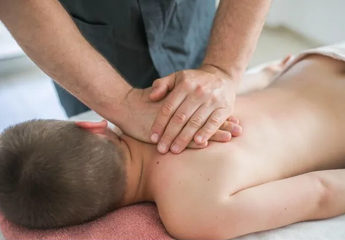 Framed Print : Boy toddler relaxes from a therapeutic massage Framed Print : Boy toddler relaxes from a therapeutic massage