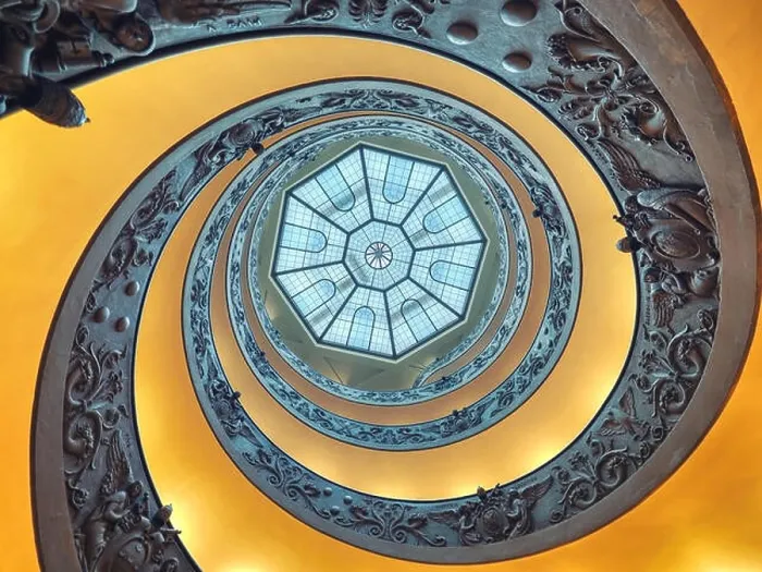 Framed Print : The Bramante Staircase is a double helix, having two staircases allowing people to ascend without meeting people descending Framed Print : The Bramante Staircase is a double helix, having two staircases allowing people to ascend without meeting people descending