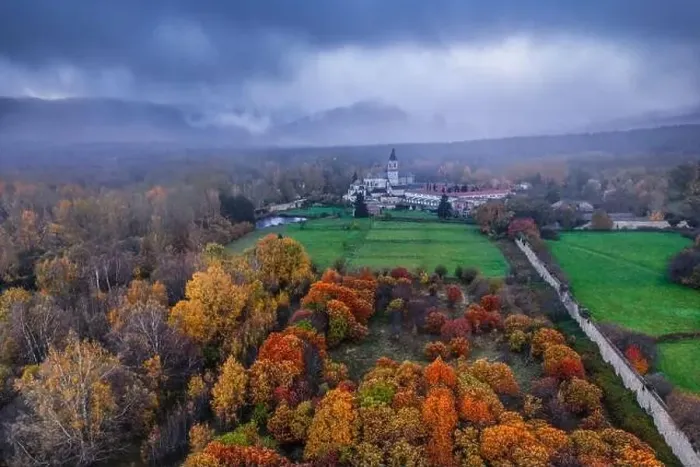 Framed Print : Breathtaking aerial view of Torla town with aged castle surrounded by lush colorful autumn trees under gloomy sky in Framed Print : Breathtaking aerial view of Torla town with aged castle surrounded by lush colorful autumn trees under gloomy sky in