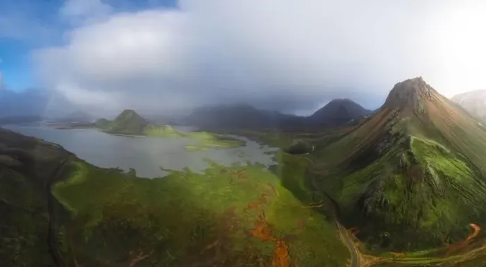 Framed Print : Breathtaking drone view of green mountains and calm lake located in volcanic terrain against cloudy blue sky in Iceland Framed Print : Breathtaking drone view of green mountains and calm lake located in volcanic terrain against cloudy blue sky in Iceland