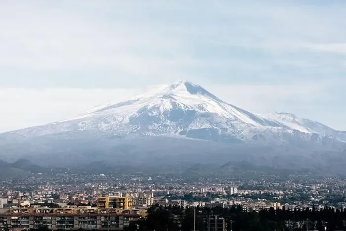 Framed Print : Breathtaking drone view of Mont Etna with snowy peak located near Catania city on cloudy day in Sicily, Italy Framed Print : Breathtaking drone view of Mont Etna with snowy peak located near Catania city on cloudy day in Sicily, Italy