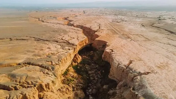 Framed Print : Breathtaking drone view of rough crack in dry soil of desert on sunny day in Iran Framed Print : Breathtaking drone view of rough crack in dry soil of desert on sunny day in Iran