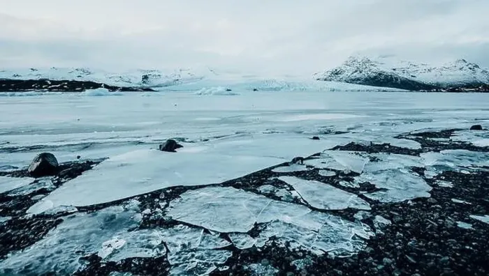 Framed Print : Breathtaking glacier in Iceland with black rock and large ice sheets, melting ice due to climate change Framed Print : Breathtaking glacier in Iceland with black rock and large ice sheets, melting ice due to climate change