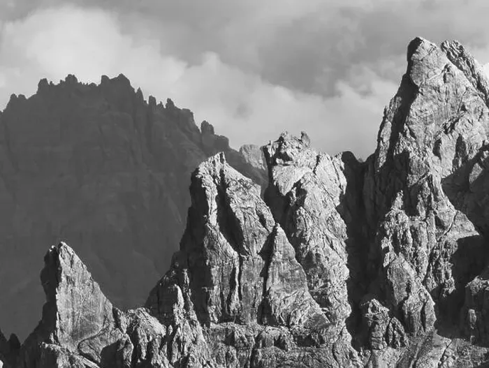 Framed Print : Breathtaking scenery of rough slope of massive rocky mountain range against clouds on sunny day in Dolomites Italy Framed Print : Breathtaking scenery of rough slope of massive rocky mountain range against clouds on sunny day in Dolomites Italy