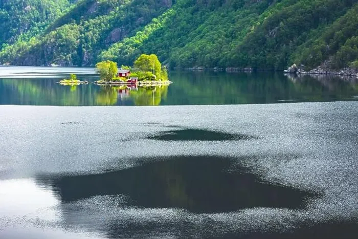 Framed Print : Breathtaking view of small island with red house in Lovrafjorden fjord, Norway. Landscape photography