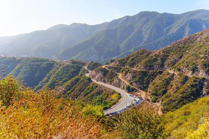 Framed Print : Breathtaking view of a winding mountain road surrounded by lush greenery in La Canada Flintridge Framed Print : Breathtaking view of a winding mountain road surrounded by lush greenery in La Canada Flintridge