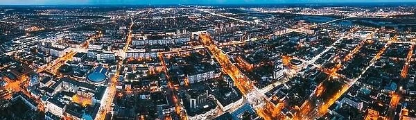 Brest, Belarus. Cityscape Skyline In Evening Illuminations. Night Bird's-eye View Of Brest Market And Pedestrian Sovietskaya Street. Panorama