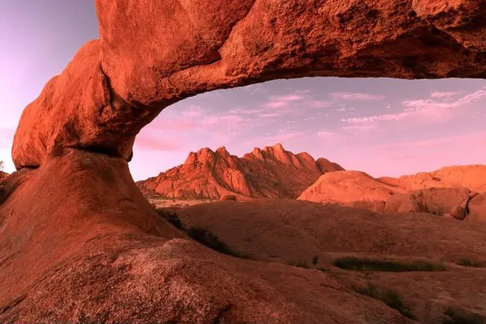 Framed Print : The Bridge, a natural arch at Spitzkoppe, at sunset Framed Print : The Bridge, a natural arch at Spitzkoppe, at sunset