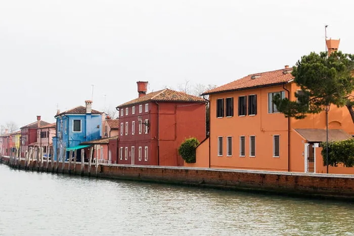 Framed Print : Brightly colored homes on Burano an island in the Venetian Lagoon Framed Print : Brightly colored homes on Burano an island in the Venetian Lagoon
