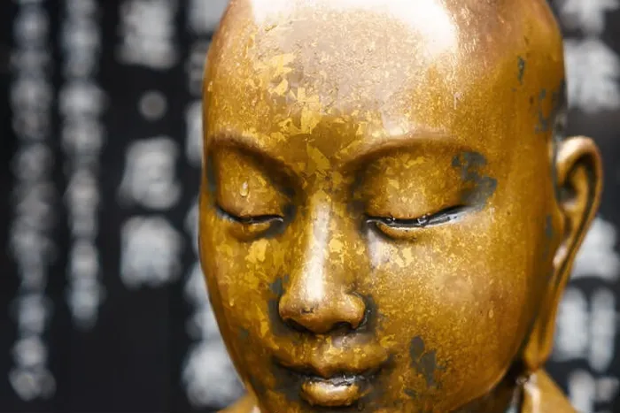 Framed Print : A bronze buddha statue at the Asakusa buddhist temple, Tokyo, Japan