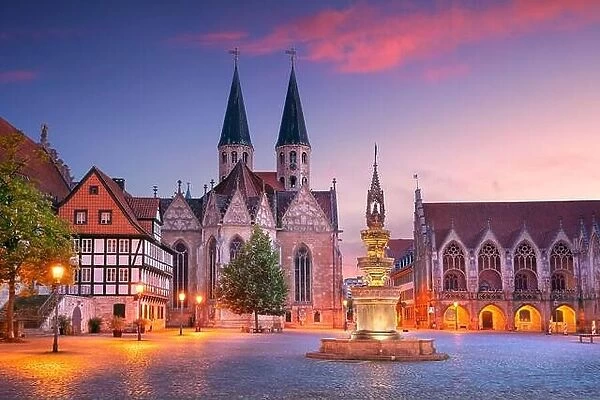 Brunswick, Germany. Cityscape image of historical downtown of Brunswick, Germany with St. Martini Church and Old Town Hall at summer sunset