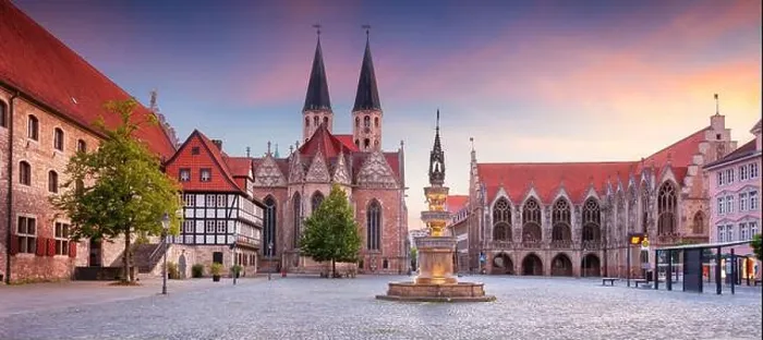 Framed Print : Brunswick, Germany. Panoramic cityscape image of historical downtown of Brunswick, Germany with St. Martini Church and Old Town Hall at summer sunset