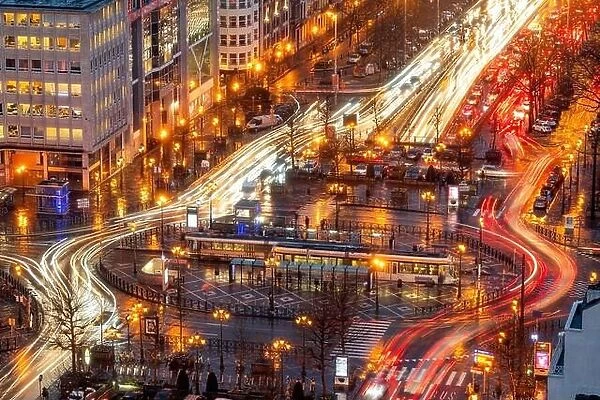 Brussels, Belgium with traffic along Boulevard de Waterloo at night