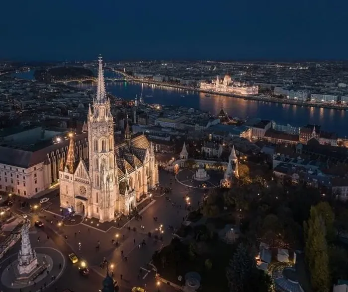 Framed Print : Budapest, Hungary - Aerial drone view of the beautiful illuminated Matthias Church at blue hour with Fisherman's Framed Print : Budapest, Hungary - Aerial drone view of the beautiful illuminated Matthias Church at blue hour with Fisherman's