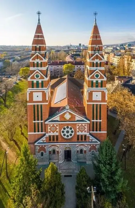 Framed Print : Budapest, Hungary - Aerial drone view of the Saint Michael's Parish Church on an autumn morning with clear blue sky Framed Print : Budapest, Hungary - Aerial drone view of the Saint Michael's Parish Church on an autumn morning with clear blue sky