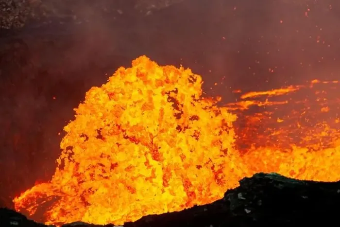 Framed Print : A burst of lava shoots out of the lava lake inside the Marum vent during an expedition to the volcano on Ambrym island Framed Print : A burst of lava shoots out of the lava lake inside the Marum vent during an expedition to the volcano on Ambrym island