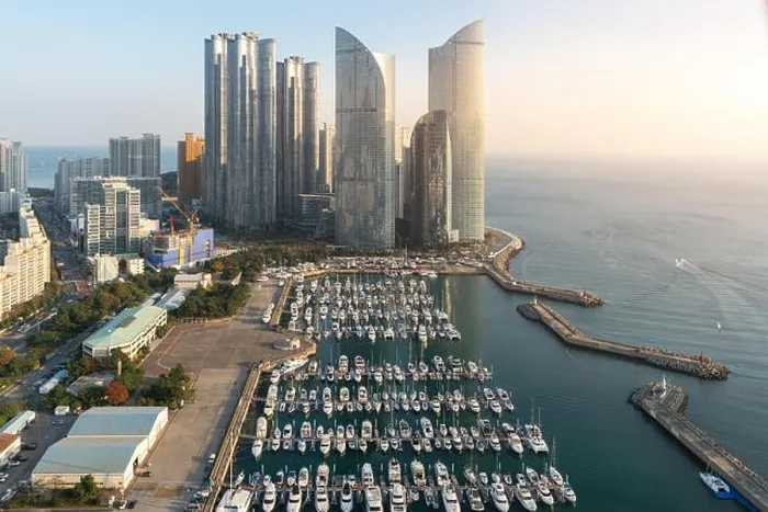 Framed Print : Busan city skyline view at Haeundae district, Gwangalli Beach with yacht pier at Busan, South Korea Framed Print : Busan city skyline view at Haeundae district, Gwangalli Beach with yacht pier at Busan, South Korea