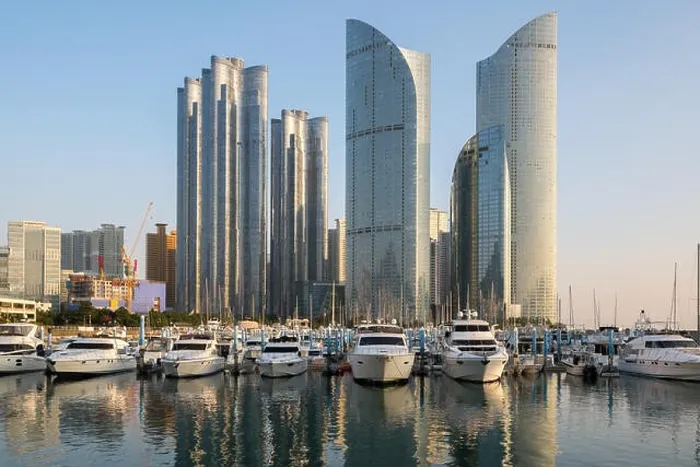 Framed Print : Busan city skyline view at Haeundae district, Gwangalli Beach with yacht pier at Busan, South Korea Framed Print : Busan city skyline view at Haeundae district, Gwangalli Beach with yacht pier at Busan, South Korea