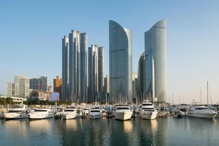 Framed Print : Busan city skyline view at Haeundae district, Gwangalli Beach with yacht pier at Busan, South Korea Framed Print : Busan city skyline view at Haeundae district, Gwangalli Beach with yacht pier at Busan, South Korea