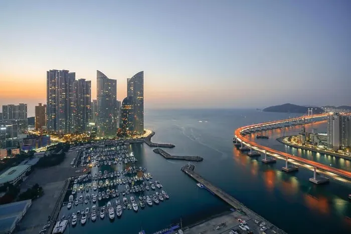 Framed Print : Busan city skyline view at Haeundae district, Gwangalli Beach with yacht pier at Busan, South Korea Framed Print : Busan city skyline view at Haeundae district, Gwangalli Beach with yacht pier at Busan, South Korea