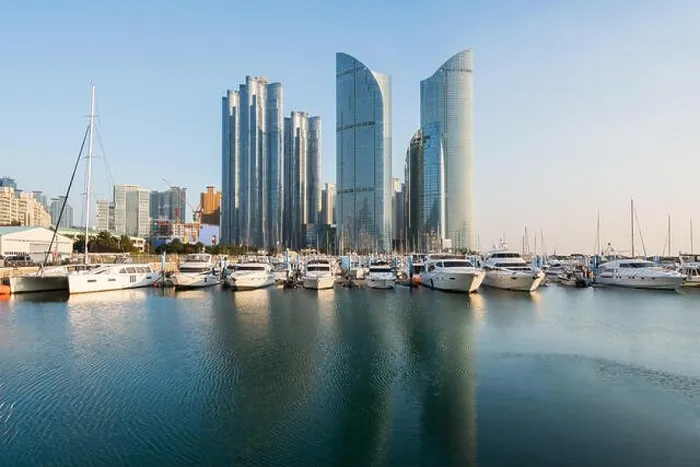 Framed Print : Busan city skyline view at Haeundae district, Gwangalli Beach with yacht pier at Busan, South Korea Framed Print : Busan city skyline view at Haeundae district, Gwangalli Beach with yacht pier at Busan, South Korea